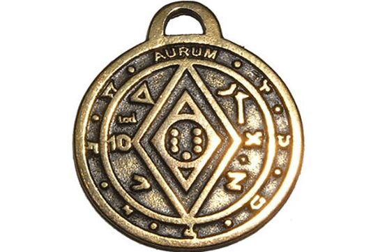 amulet of coins for luck and wealth