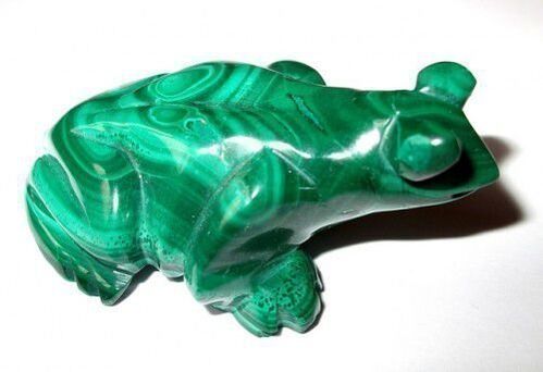 green malachite frog in the form of a good luck amulet